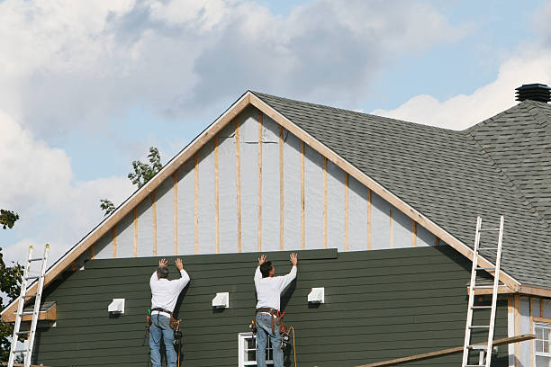 Professional Siding Repair technician working in Richland, GA